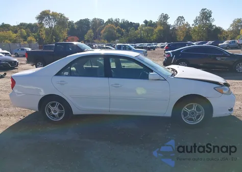 2002 Toyota Camry Le from USA, damaged, VIN 4T1BE32K82U042045